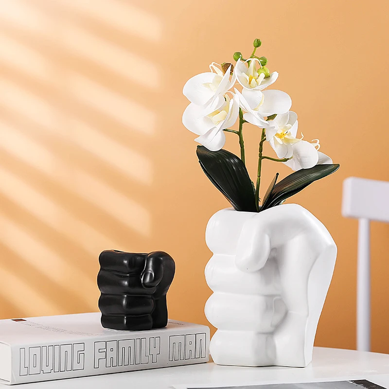 

Wholesale modern Table ornament porcelain flower pot home decor craft Fist shape Black and white ceramic vases for wedding gift