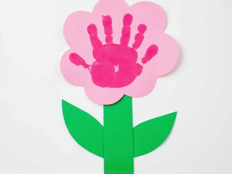 Child's handprint flower craft with construction paper