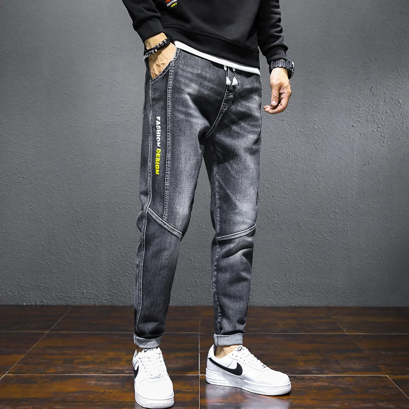

Mico Elastic Denim Wahsed Mid Waist Logo Design Men's Jeans Loose Haren Pants Long Distressed Men's Trousers