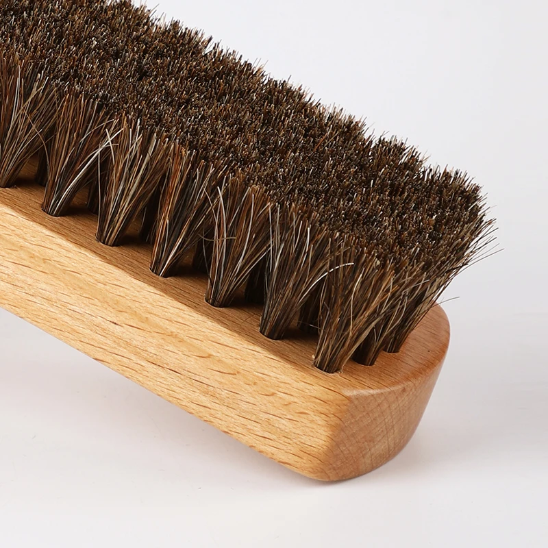 

Horsehair shoe polish brush with wooden handle, used for boot leather care and cleaning shoe brush