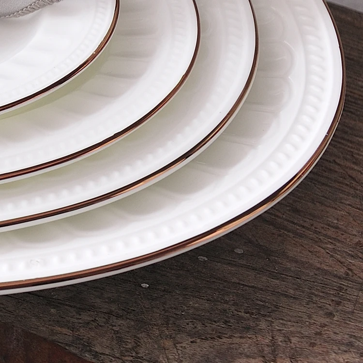 white catering dinner plates with gold edge