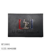 

OEM Customized Zinc Alloy Metal Logo Pu Leather Labels For Jeans Pants