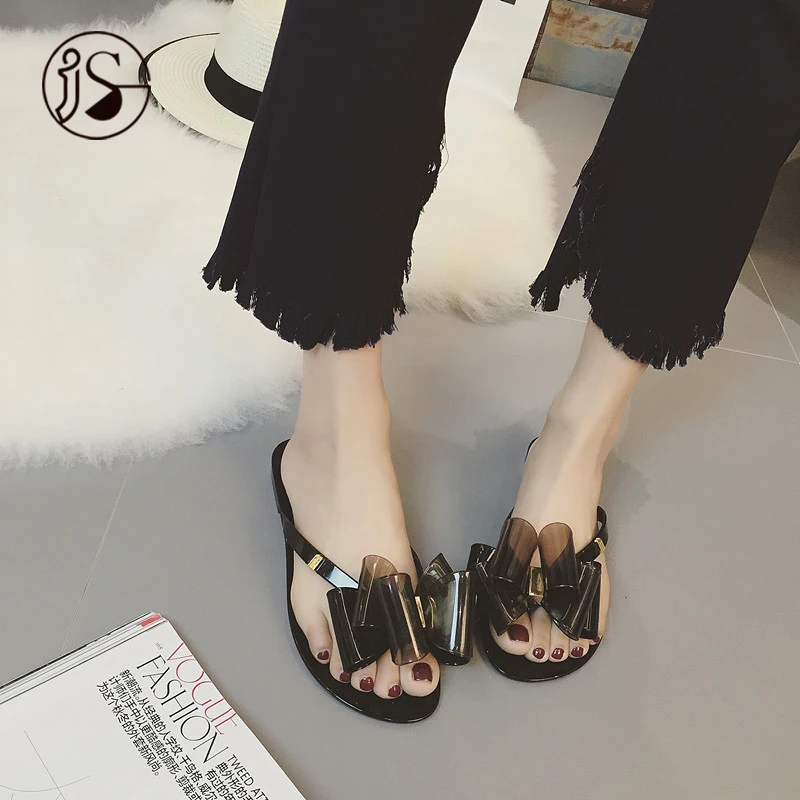 

Delicate and beautiful fashion women's slippers Three-dimensional bow decoration PVC material transparent summer slippers, Picture
