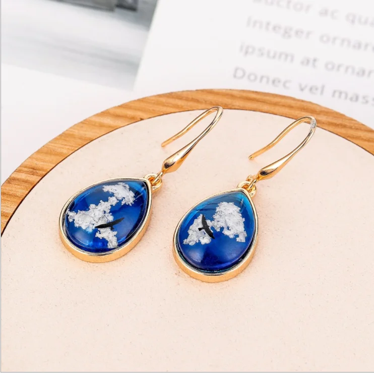 

Elegant blue sky white clouds earrings eagle pendant drop shaped resin alloy earrings for women gifts, Picture