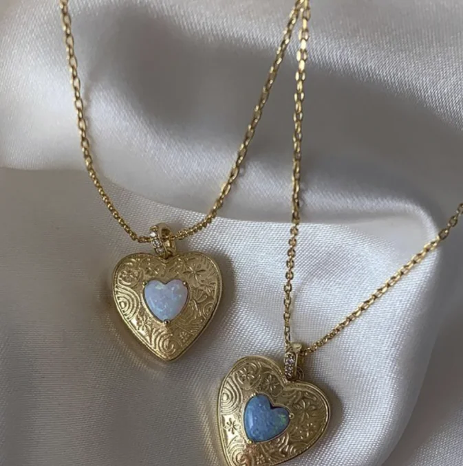 

OUYA Heart-shaped gift Fashion metal alloy retro blue O Bao double love necklace ornaments