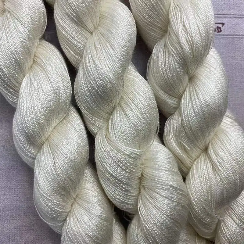 

China factory price 2/48Nm raw white100% pure mulberry raw silk for weaving natural spun silk dyed yarn cone silk yarn