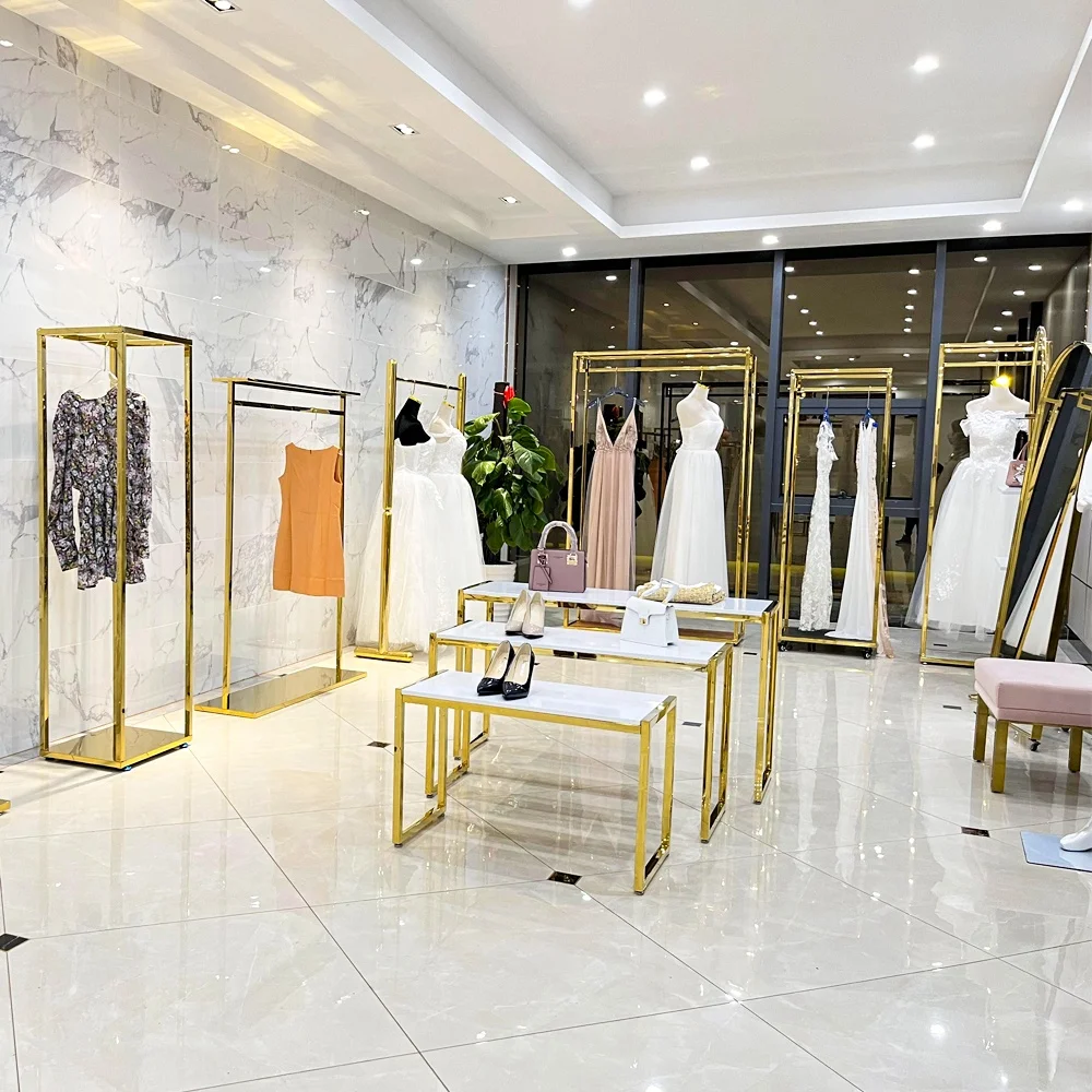 

Modern Style Retail Store Fixture Hanging Golden Stainless Steel Garment Clothing Display Racks Standing For Clothes Store