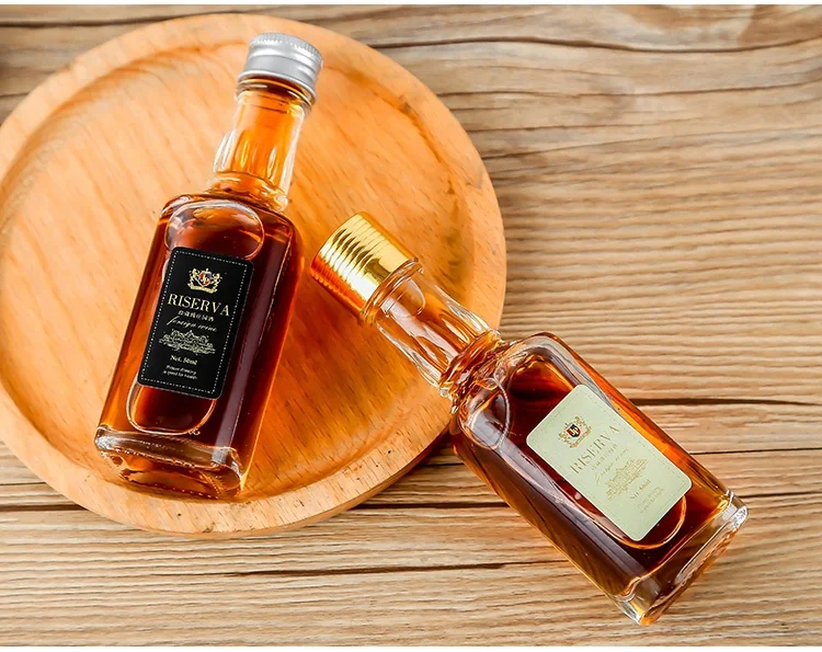 
25ml 50ml 70ml Mini Glass Bottle Clear Wine Liquor Alcohol Spirits Bottle Sales Empty Square Round Glass Bottle 