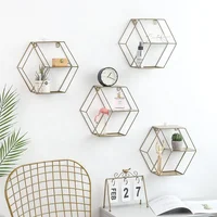 

Wholesale High Quality Living Room Home Decoration Accessories Organizer Hexagon Metal Wall Shelf Mounted Hanging Shelf