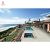 outdoor spa hotel swimming pool surrounding non slip sandstone tiles