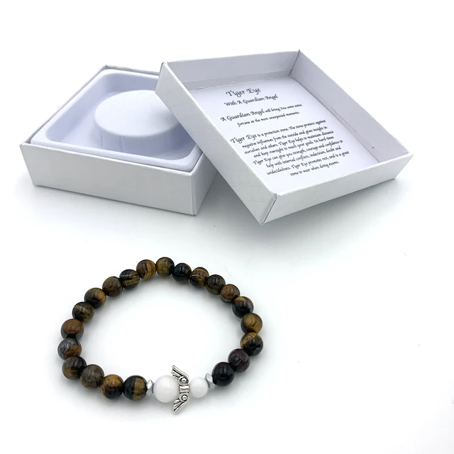 

Gemstone bracelet It had angel wings on it appearance is very nice Perfect for gifts Tiger eye