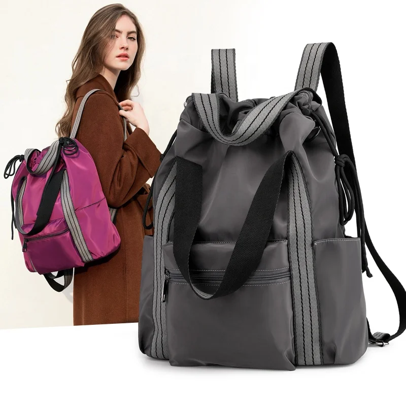 

Fashion lady multifunctional big capability light hand shoulder carry hot sell nylon plain backpack college