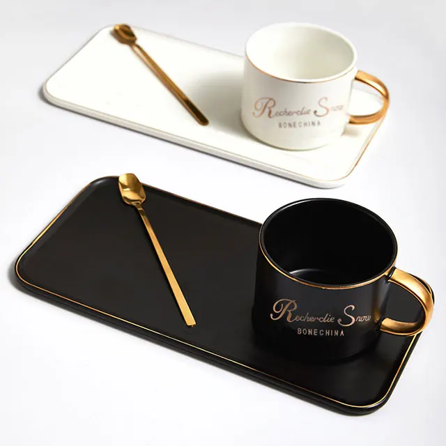 

Wholesale Gold Rim Eectangular Ceramic Coffee Cup And Saucers Set With Golden Spoon Logo Support Customized, Black,white