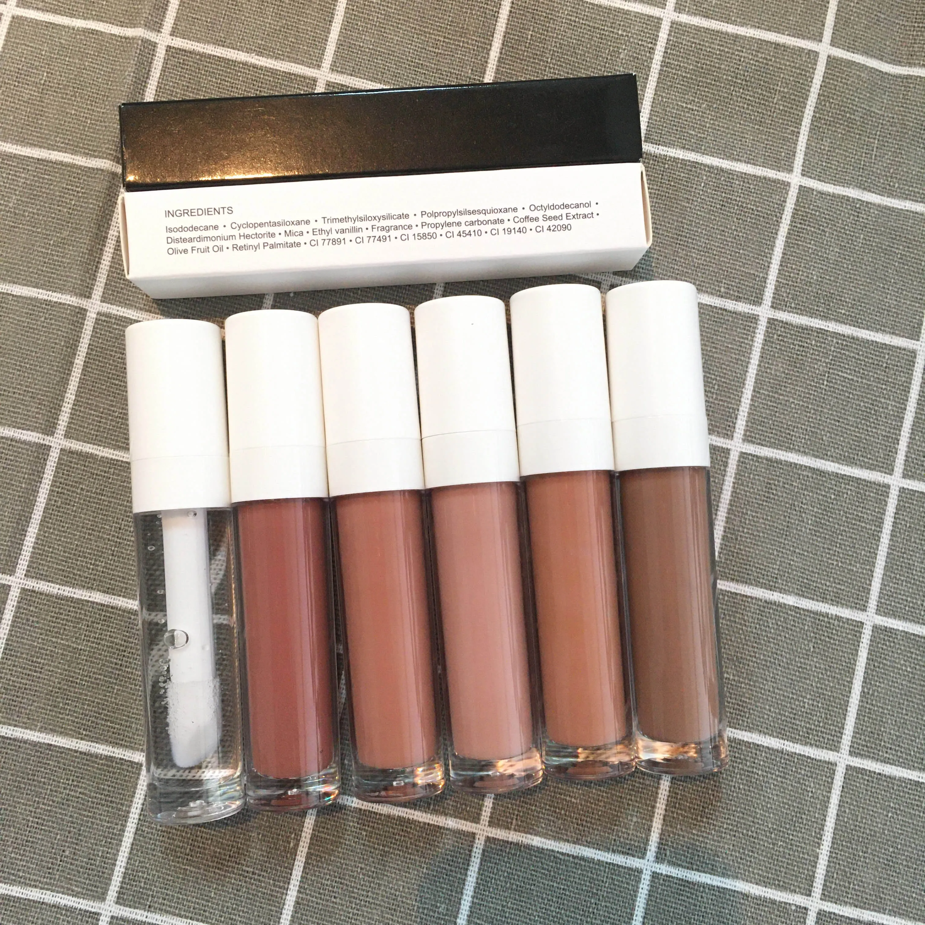 

Popular white tube natural makeup liquid glossy gloss vegan nude clear private label lipgloss