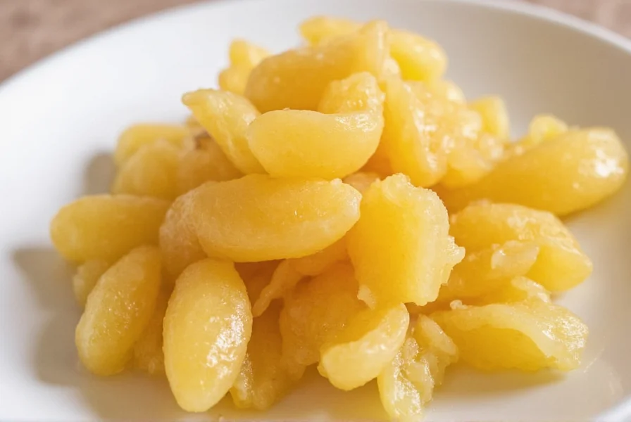 Step-by-step preparation of homemade candied ginger showing ginger slices in sugar syrup