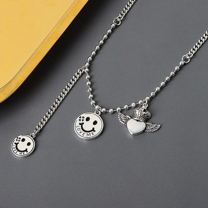 

Double layer smiling face Necklace women's European and American hip hop tassel crown love angel clavicle chain jewelry