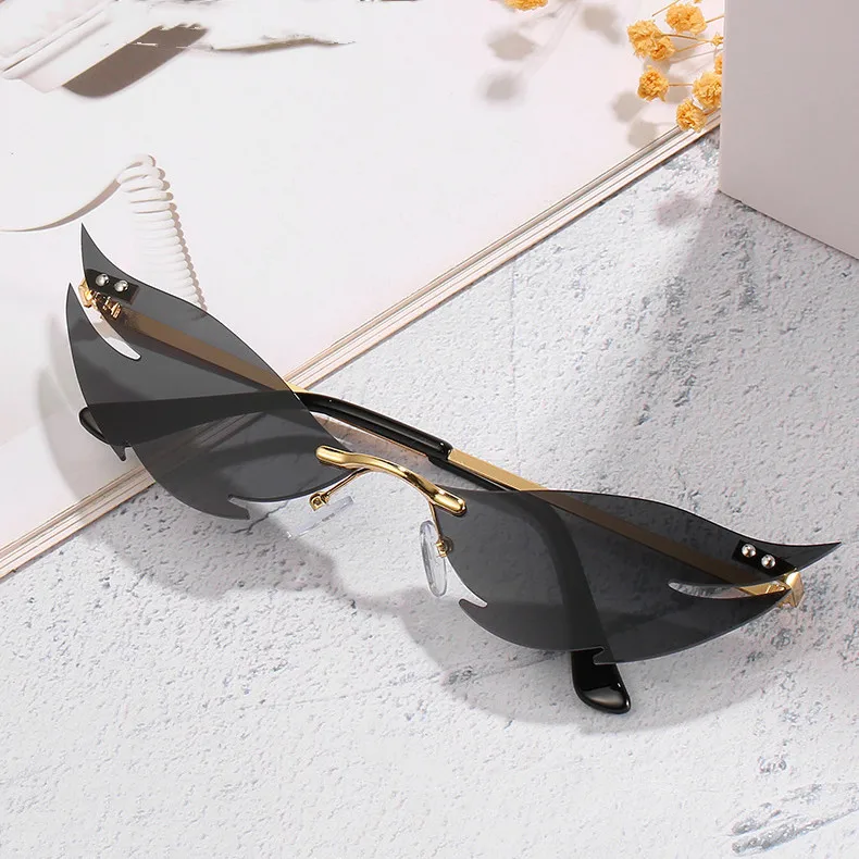 

New Rimless Metal Sunglasses Fashion Lady Sunglasses Shark Shaped Red Lens Shades Glasses