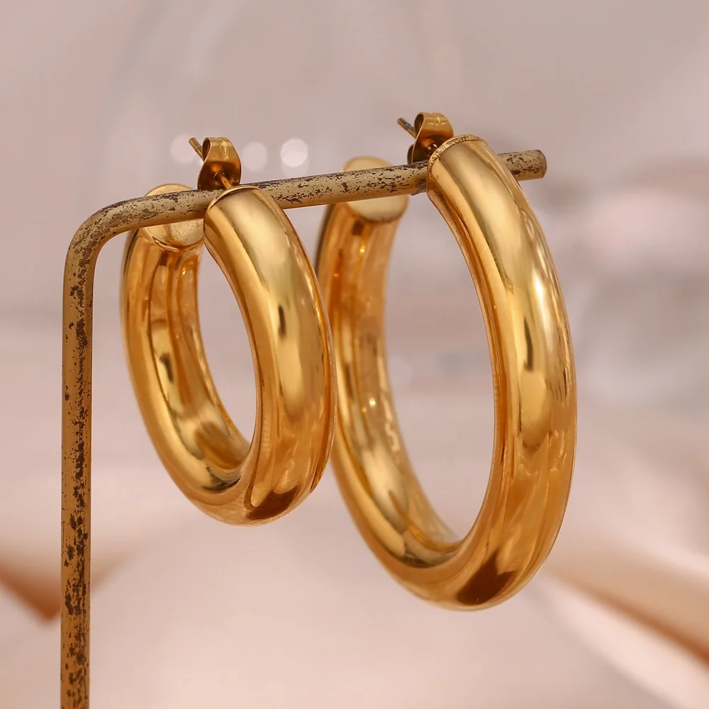 

Minimalist Hollow Out 18K Gold Plated Stainless Steel Hoop Earring Wholesale Statement Fashion Earrings 2022