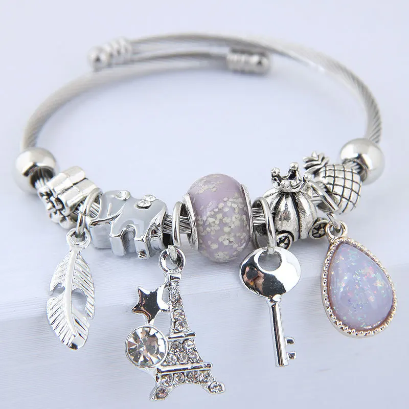 

Fashionable DIY Metal Tower and Feather Charm Bracelet Wholesale Newest Handmade Jewelry Luxury Stainless Steel Bangle