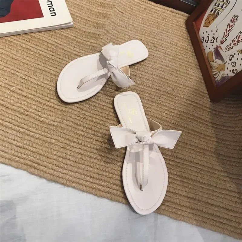 

Factory wholesale new summer toe clip T-type sweet bow flat bottom sandals Holiday Beach, Black,camel,yellow,white