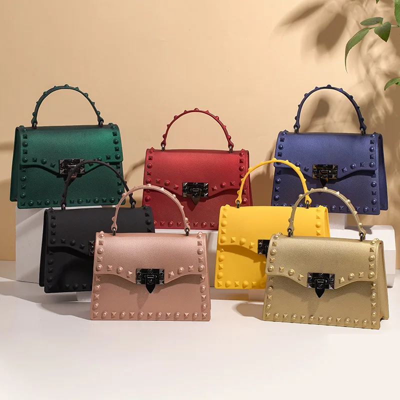 

Fashion Portable Jelly PVC Rivet Purse Girl Hold Umbrella Sunglasses Mobile Phone Handbag, Red, black, blue, etc.