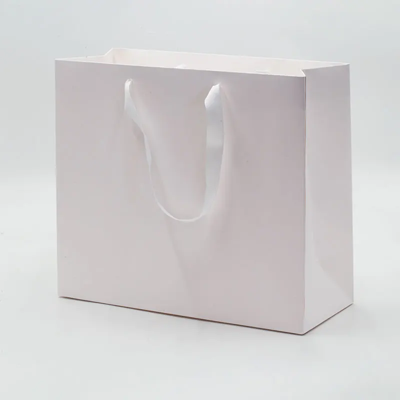 

Luxury moisture proof custom bulk white shopping paper gift bag wholesale