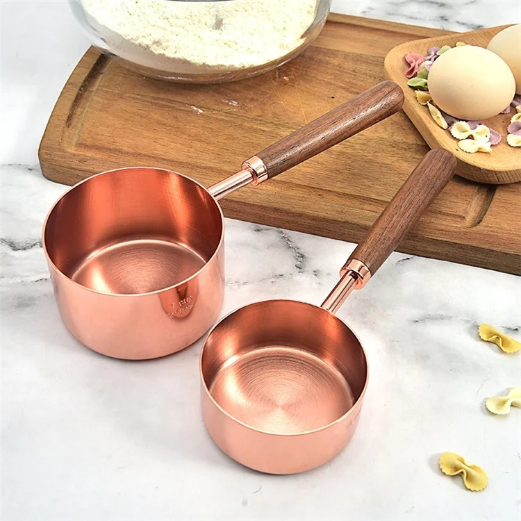 

8 piece copper plated measuring cups and measuring spoons set with wooden handle, Silver