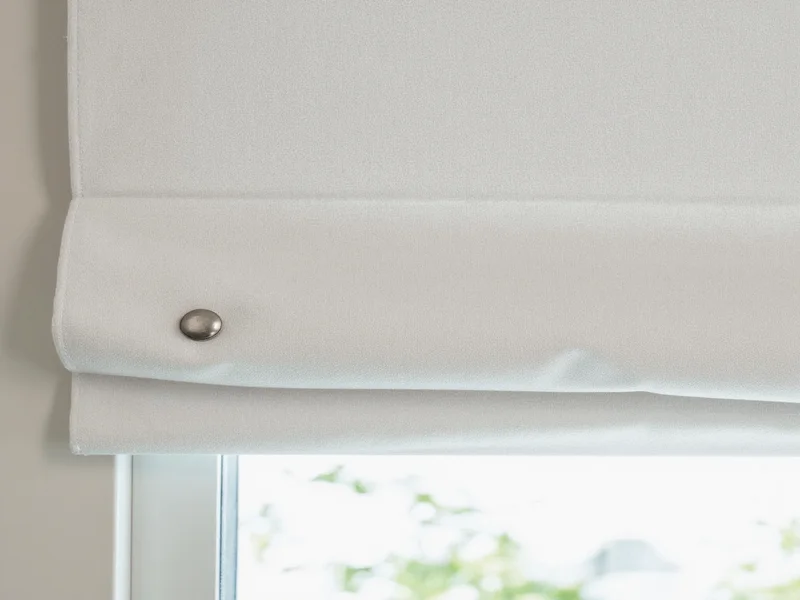 Roman shade assembly showing fabric stapled to mounting board with dowel positions