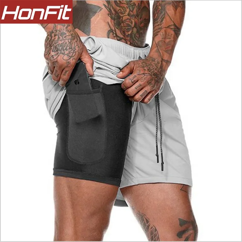 

Wholesale Athletic good quality plus size 2 in 1 male active wear shorts for men, Customized colors