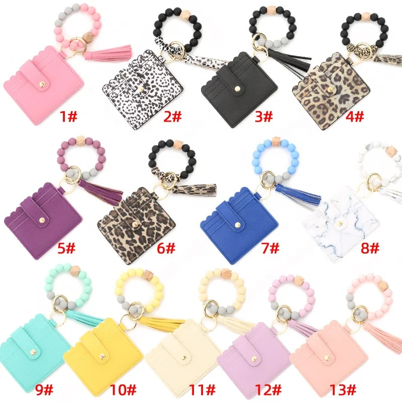 

Amazon PU Leather Tassel Bangle Wristlet Keychain Ladies Silicone Wooden Bead ID Credit Card Wallet Keychain, 13 colors