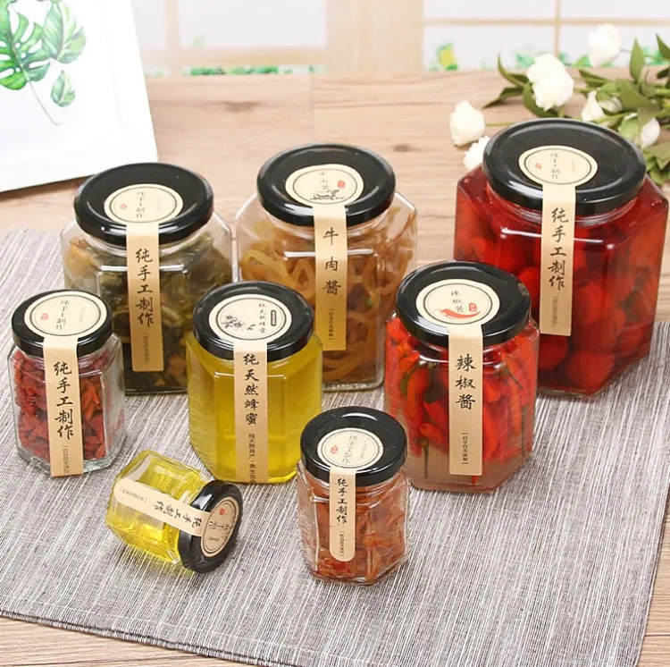 

Wholesale cheap hexagon food storage empty honey bee glass jar for canning with metal lid, Clear