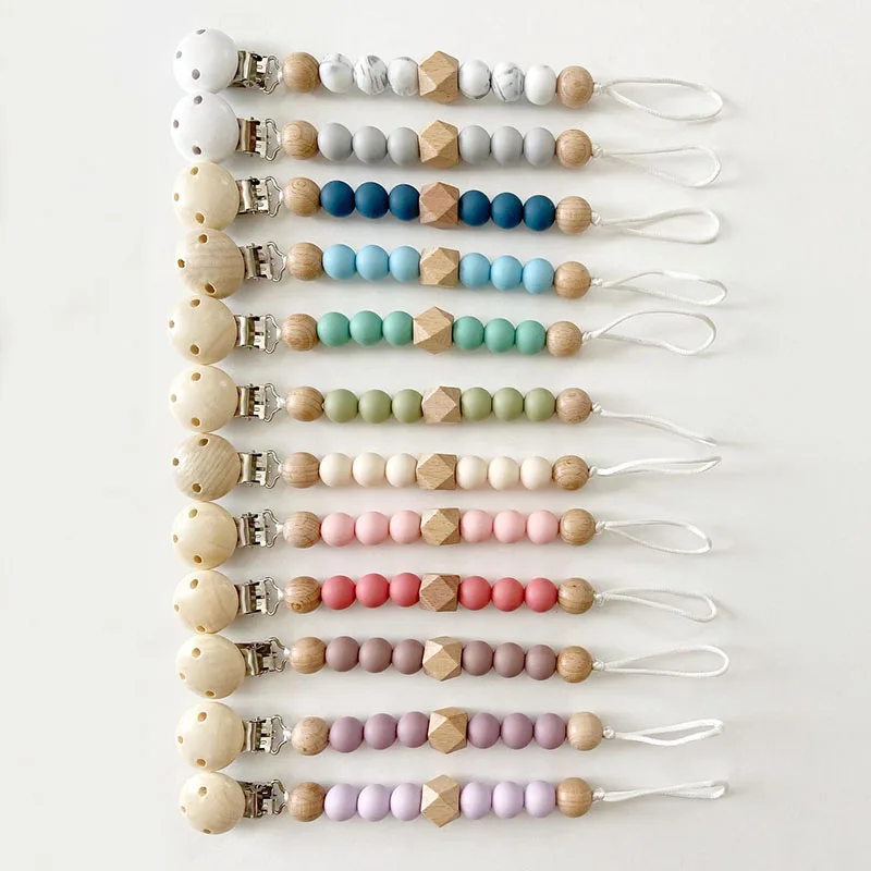 

Wholesale Silicone Wooden Beads Infant Teething Dummy Chain