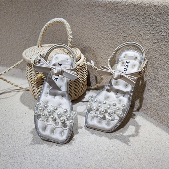 

Soft flat square toe open-toe sandal with pearl temperament