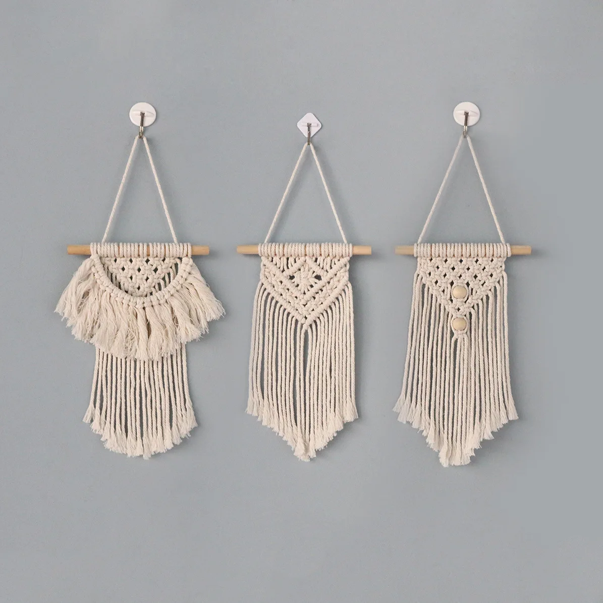 

Manufacturers stock bohemian hand-woven wall hangings, cotton rope wall decorations, Nordic style tassel wall hangings