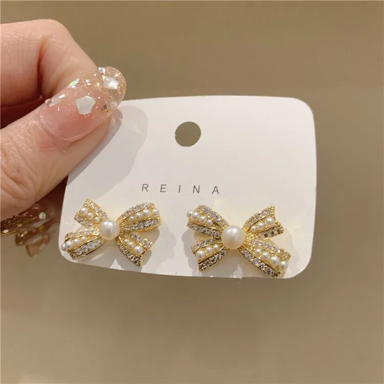 

South Korea 2022 New Bow-knot Earrings Temperament Light Luxury Niche Design Temperament Earrings Women, Picture shows