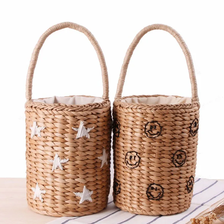 

Hand carry embroidered stars smiley face straw summer vacation beach tote bag