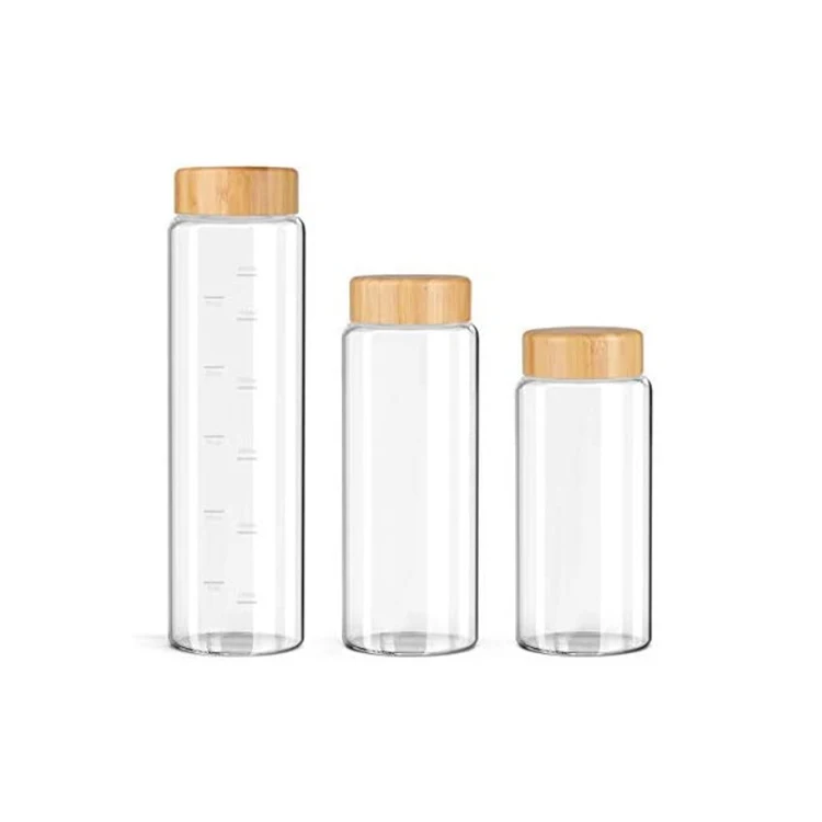 

Hot Selling Portable Reusable Water Borosilicate Glass Water Bottles 600ml With Free Cup Brush, Clear