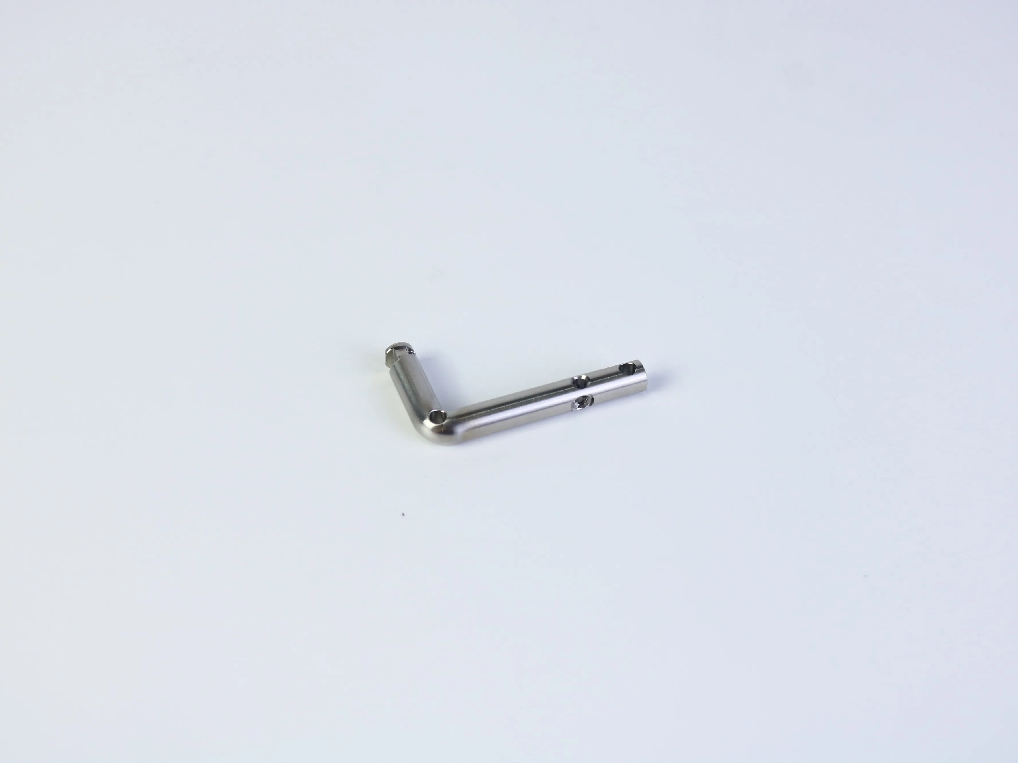 Machined holes on stainless steel component