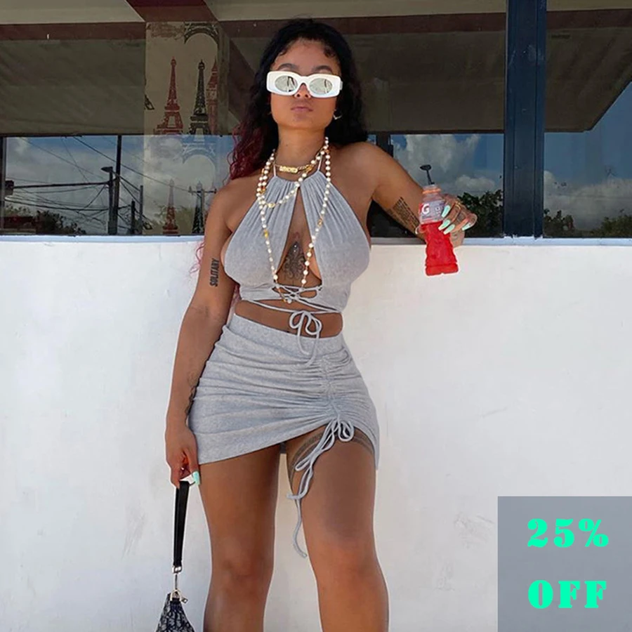 

Hot Selling Women's New Fashion Hanging Neck Band Hollowed-out Vest Drawstring Short Skirt Set Skirt Summer Two Piece Skirt Set, Customized color