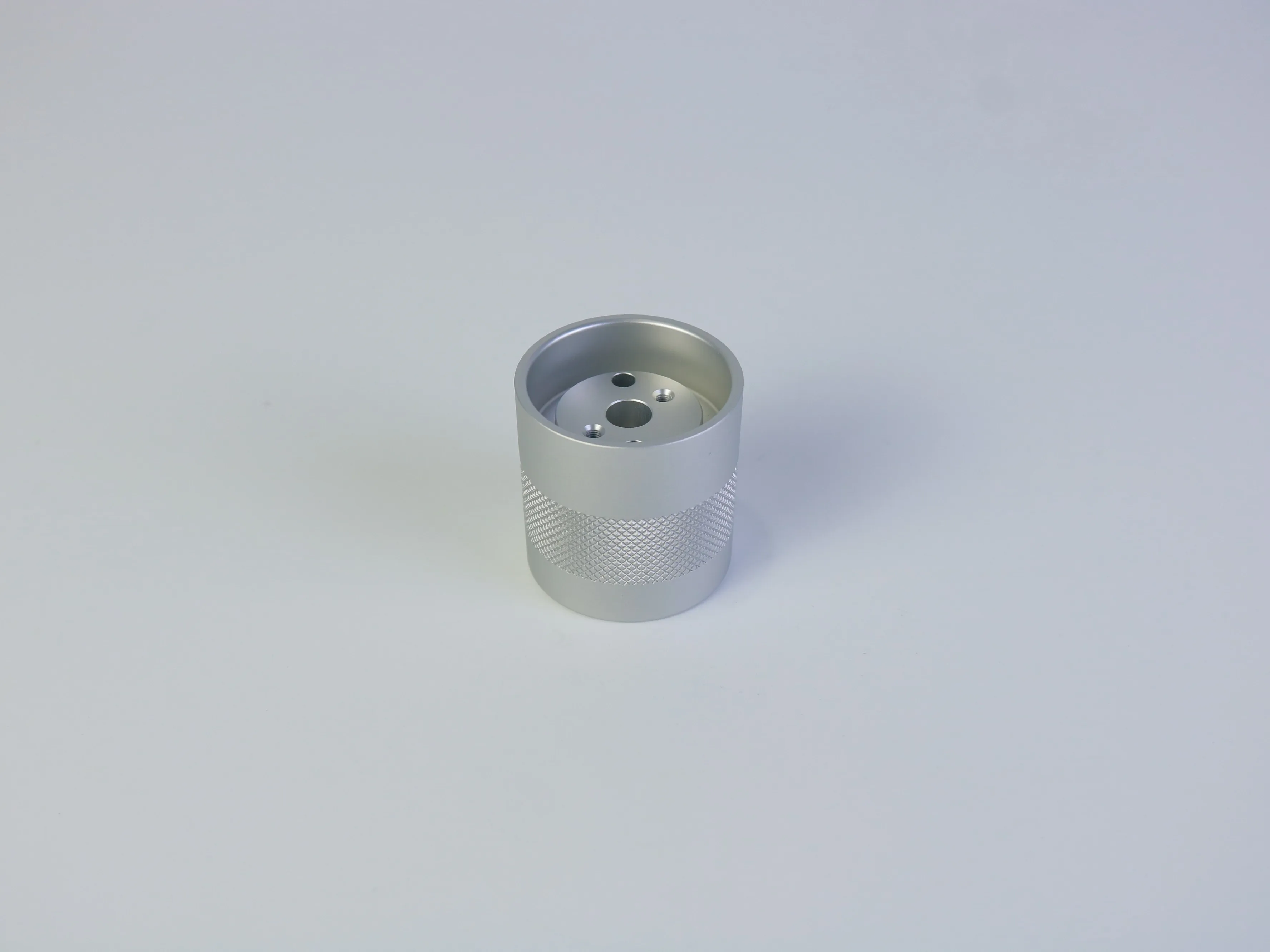 Internal cavity and end-face openings on a custom CNC machined aluminum housing