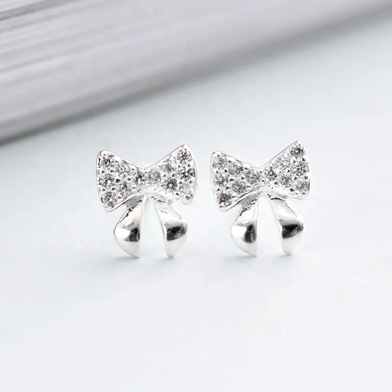 

Earrings 925 Sterling Silver rhodium bow Stud Earrings