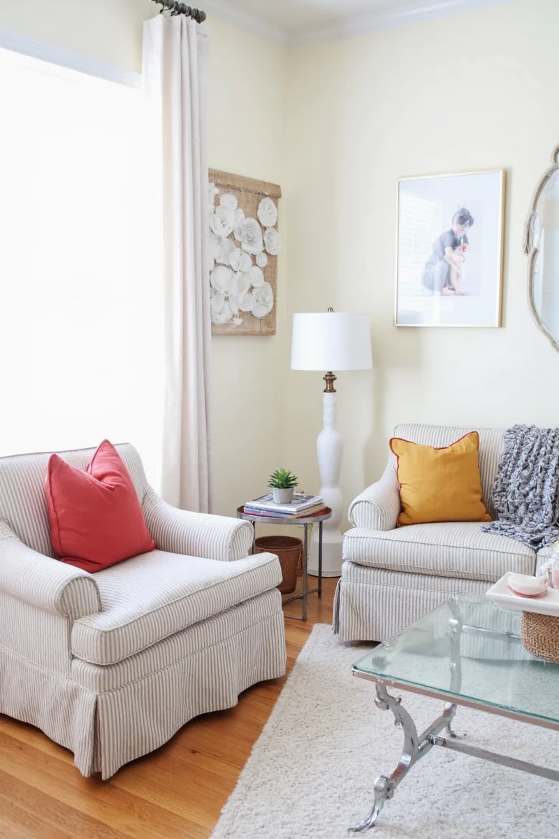 IKEA slipcover chair with dog nearby