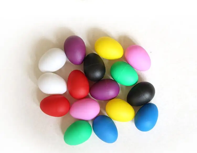 

Children musical instruments cartoon colorful Sand Hammer Egg Shaker Toy plastic egg shakers