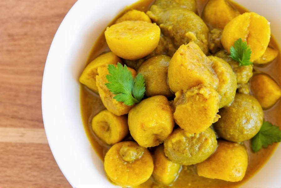 Trinidad Curry Powder on wooden table with spices
