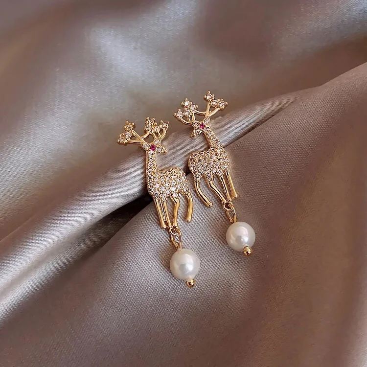 

Creative personality plum blossom little Milu deer earrings sweet temperament all kinds of pearl pendants earrings wholesale