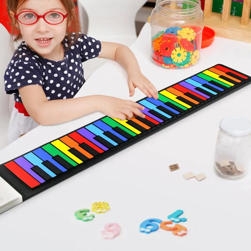 

Huaskyera The best toy silicone hand roll piano for kids portable electric piano supports earphone microphone, Colorful