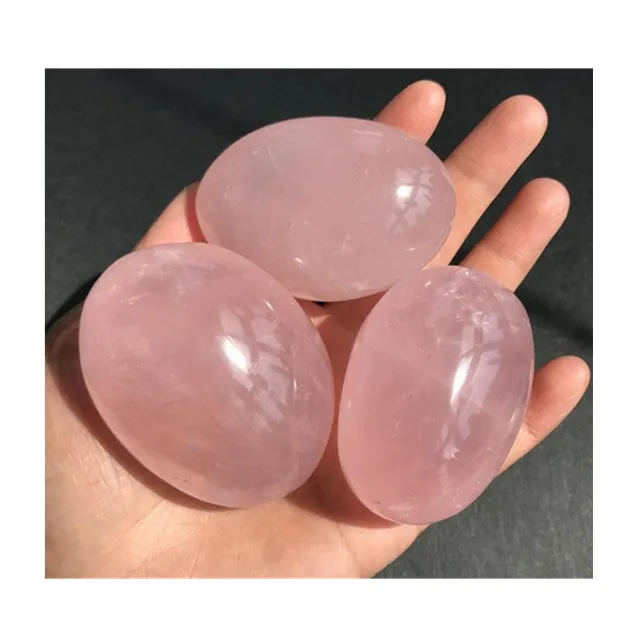 

Wholesale natural quartz pink color rose quartz crystal palm stones carvings crystal palm stones