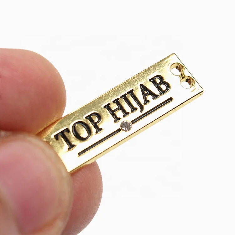 

Sew On Custom Metal Brass Brand Logo Golden Plate Labels for Handbags