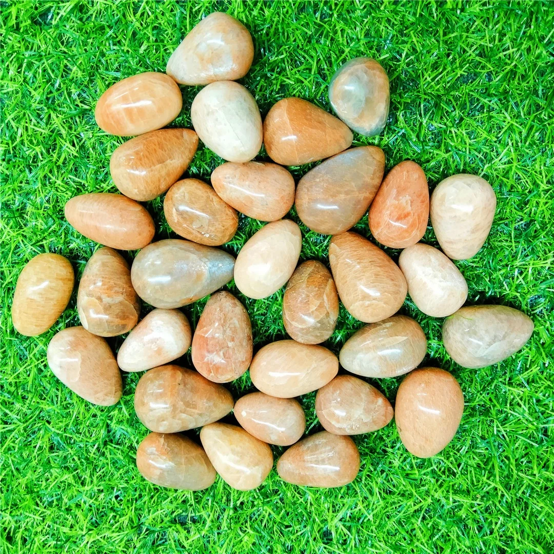 

Natural Massager Crystal Massage Egg Orange Moonstone Crystal Carving