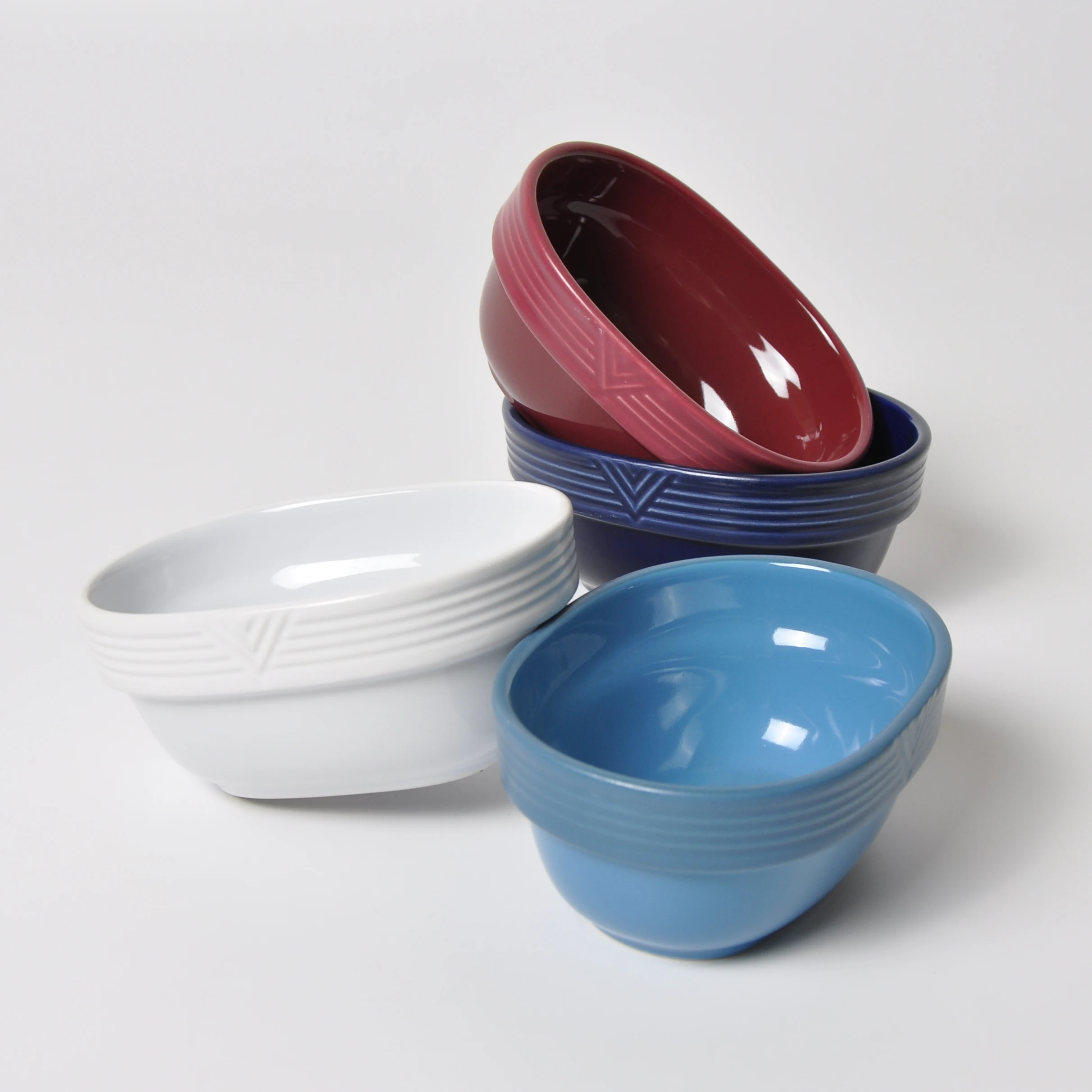 
New Design Colored Glaze Relievo Intagkio Oval Creamic Dinner Bowls Luxury Ceramic Bowl 